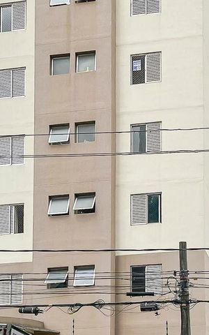 Apartamento à venda com 59m², 2 quartos e 1 vagaFachada + plaquinha