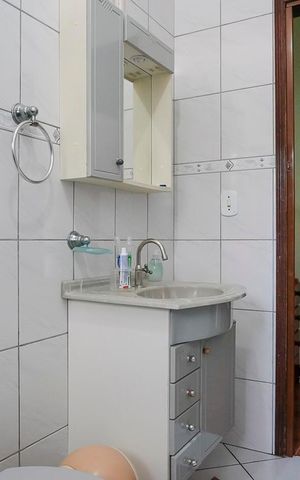 Casa à venda com 216m², 2 quartos e 4 vagasBanheiro da suíte 2