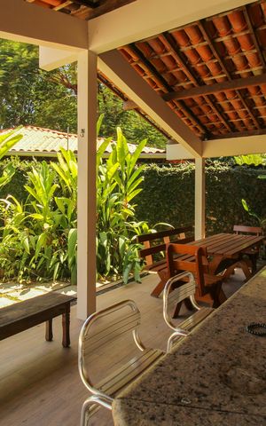 Casa de condomínio à venda com 1036m², 4 quartos e 3 vagas Casa de condomínio à venda com 1036m², 4 quartos e 3 vagasÁrea da churrasqueira