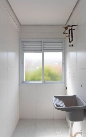 Apartamento à venda com 54m², 2 quartos e 1 vaga Apartamento à venda com 54m², 2 quartos e 1 vagaCozinha e Área de Serviço