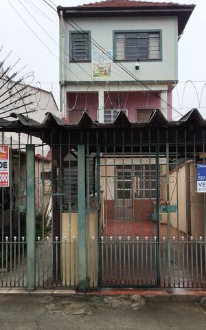 Casa à venda com 265m², 8 quartos e 5 vagas Casa à venda com 265m², 8 quartos e 5 vagasFachada e Placa