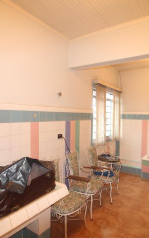 Casa à venda com 265m², 8 quartos e 5 vagasCasa 1 - Área de Serviço