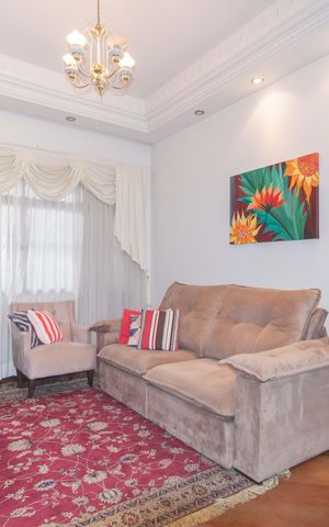 Casa à venda com 268m², 5 quartos e 3 vagasSala de Estar
