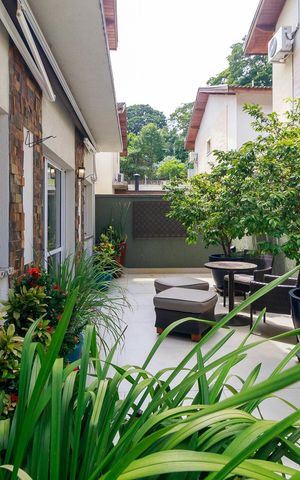 Casa de condomínio à venda com 447m², 4 quartos e 5 vagas Casa de condomínio à venda com 447m², 4 quartos e 5 vagasQuintal
