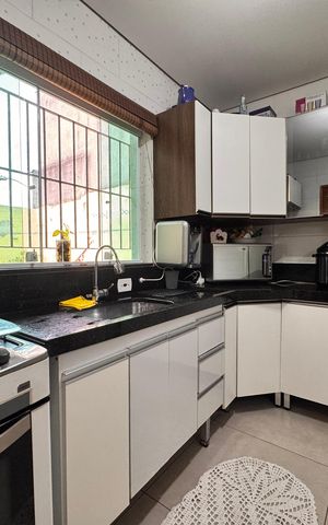 Casa à venda com 124m², 2 quartos e 3 vagas Casa à venda com 124m², 2 quartos e 3 vagasCozinha