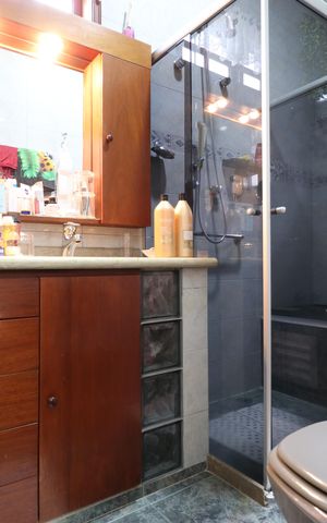 Casa à venda com 342m², 4 quartos e 3 vagasBanheiro da Suíte 4
