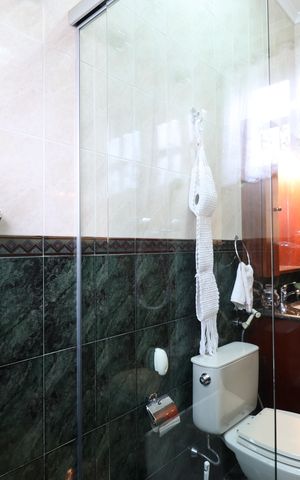 Casa à venda com 342m², 4 quartos e 3 vagasBanheiro da Suíte 1