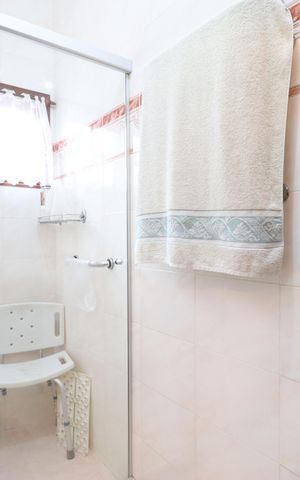 Casa à venda com 342m², 4 quartos e 3 vagasBanheiro da Suíte 2