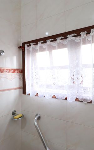 Casa à venda com 342m², 4 quartos e 3 vagasBanheiro da Suíte 2