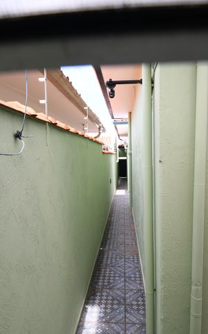 Casa à venda com 208m², 3 quartos e 2 vagasBanheiro de serviço - Vista 