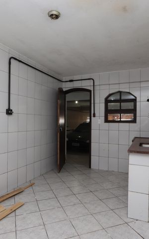 Casa para alugar com 180m², 3 quartos e 8 vagasCozinha do Térreo