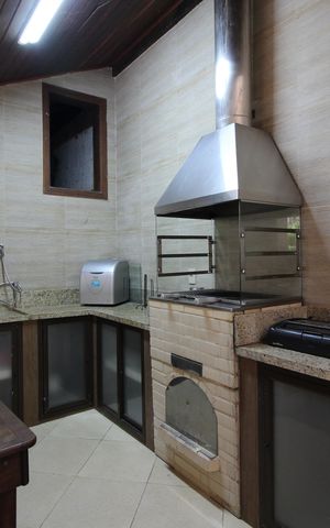 Casa de condomínio à venda com 428m², 4 quartos e 4 vagasChurrasqueira