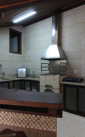 Casa de condomínio à venda com 428m², 4 quartos e 4 vagasChurrasqueira