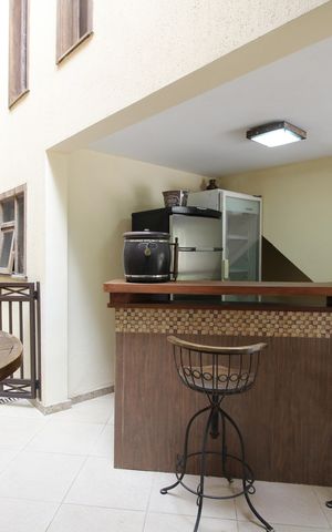 Casa de condomínio à venda com 428m², 4 quartos e 4 vagasBar