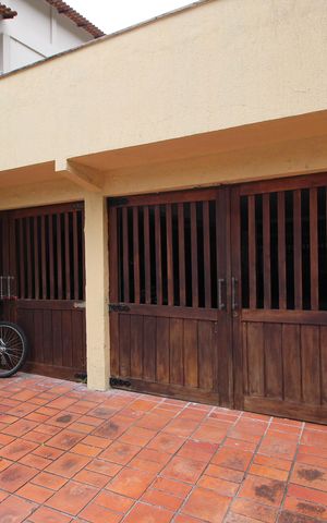 Casa de condomínio à venda com 428m², 4 quartos e 4 vagasGaragem