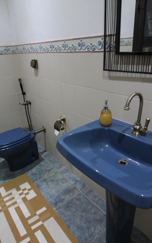 Casa de condomínio à venda com 428m², 4 quartos e 4 vagasLavabo