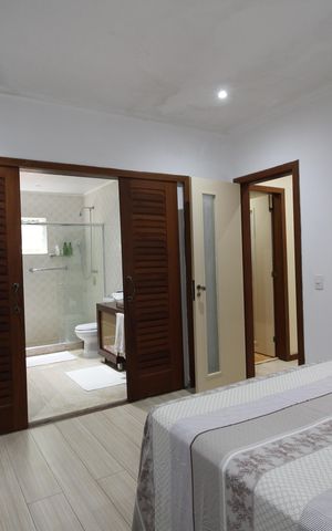 Casa de condomínio à venda com 428m², 4 quartos e 4 vagasQuarto 3 - Suíte
