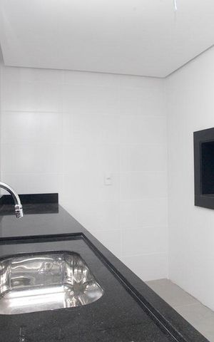 Apartamento à venda com 89m², 2 quartos e 2 vagasCozinha + Área de Serviço