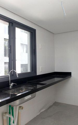 Apartamento à venda com 89m², 2 quartos e 2 vagasCozinha + Área de Serviço