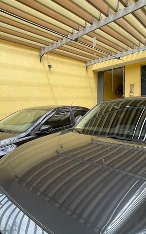 Casa à venda com 175m², 4 quartos e 2 vagas Casa à venda com 175m², 4 quartos e 2 vagasGaragem