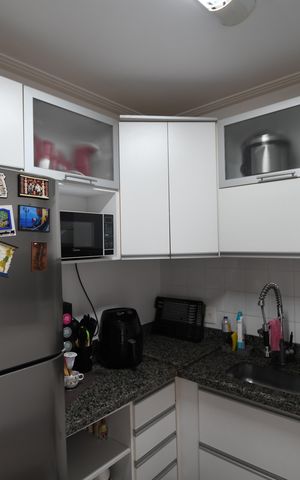 Casa de condomínio para alugar com 100m², 2 quartos e 2 vagasCozinha