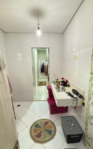Casa à venda com 214m², 4 quartos e 4 vagas Casa à venda com 214m², 4 quartos e 4 vagasBanheiro da Suíte