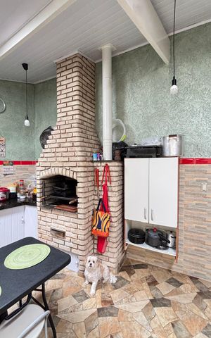 Casa à venda com 214m², 4 quartos e 4 vagas Casa à venda com 214m², 4 quartos e 4 vagasCozinha 2