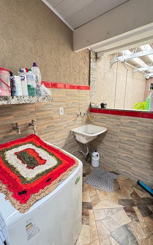 Casa à venda com 214m², 4 quartos e 4 vagas Casa à venda com 214m², 4 quartos e 4 vagasArea de Serviço 2