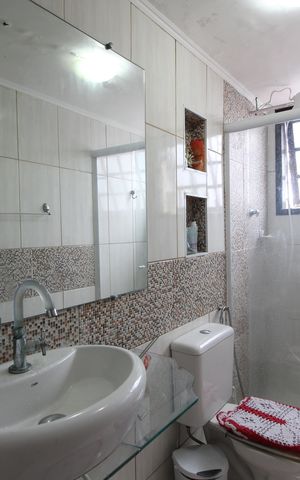 Casa de condomínio à venda com 250m², 4 quartos e 3 vagasBanheiro Social