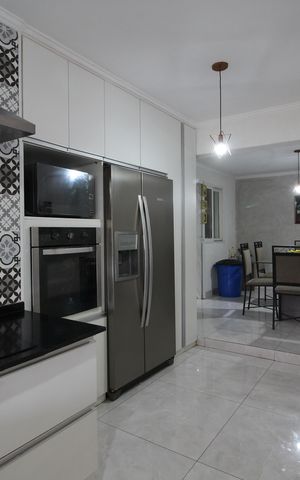 Casa de condomínio à venda com 250m², 4 quartos e 3 vagasCozinha