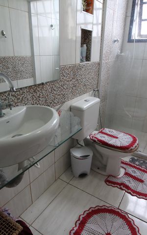 Casa de condomínio à venda com 250m², 4 quartos e 3 vagasBanheiro Social