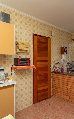 Casa à venda com 133m², 3 quartos e 2 vagas Casa à venda com 133m², 3 quartos e 2 vagasCozinha