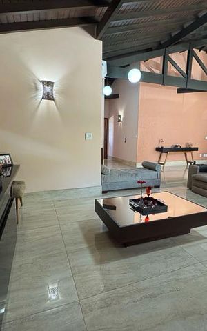 Casa à venda com 1000m², 4 quartos e 8 vagasSala
