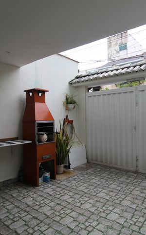 Casa de condomínio à venda com 112m², 3 quartos e 1 vagaChurrasqueira