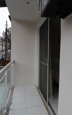 Casa de condomínio à venda com 112m², 3 quartos e 1 vagaSuíte - Varanda