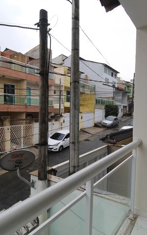 Casa de condomínio à venda com 112m², 3 quartos e 1 vagaSuíte - Varanda