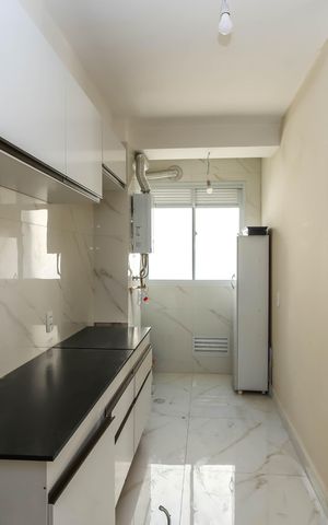 Apartamento à venda com 55m², 2 quartos e 1 vagaCozinha e Área de Serviço