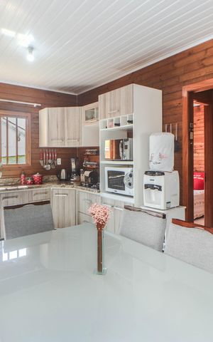 Casa à venda com 78m², 2 quartos e 2 vagas Casa à venda com 78m², 2 quartos e 2 vagasCozinha