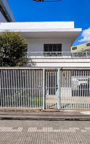 Casa à venda com 340m², 4 quartos e 4 vagas Casa à venda com 340m², 4 quartos e 4 vagasFachada