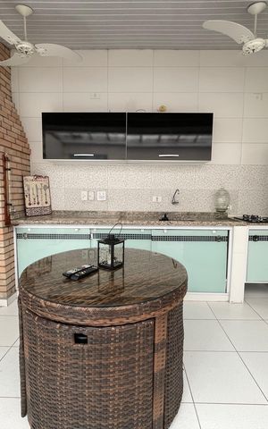 Casa à venda com 170m², 4 quartos e 4 vagas Casa à venda com 170m², 4 quartos e 4 vagasChurrasqueira