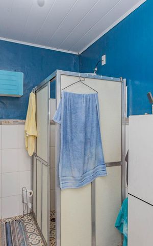 Casa à venda com 186m², 5 quartos e 4 vagasBanheiro