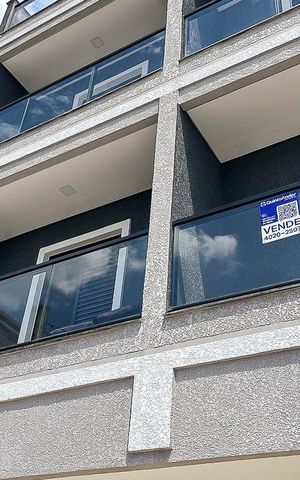 Apartamento à venda com 70m², 3 quartos e 2 vagasFachada + plaquinha