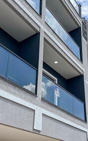 Apartamento à venda com 70m², 3 quartos e 2 vagasFachada + plaquinha