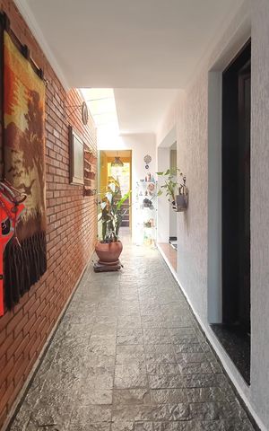 Casa à venda com 275m², 3 quartos e 2 vagaslateral da sala