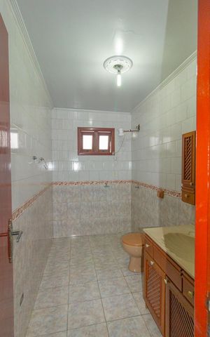 Casa à venda com 250m², 3 quartos e 4 vagas Casa à venda com 250m², 3 quartos e 4 vagasBanheiro da Suíte 1