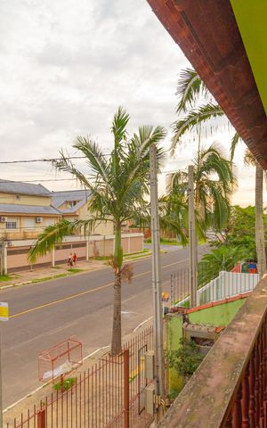 Casa à venda com 250m², 3 quartos e 4 vagas Casa à venda com 250m², 3 quartos e 4 vagasVaranda da Sala 3