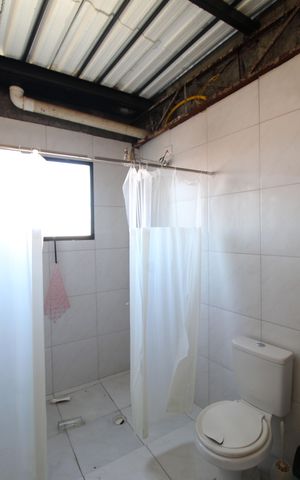 Casa de condomínio à venda com 176m², 2 quartos e 2 vagasBanheiro do Terraço