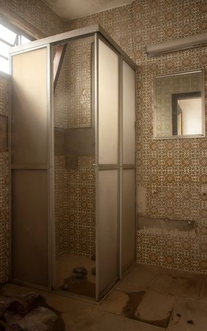 Casa à venda com 660m², 3 quartos e 3 vagasEdícula - Banheiro da Suíte