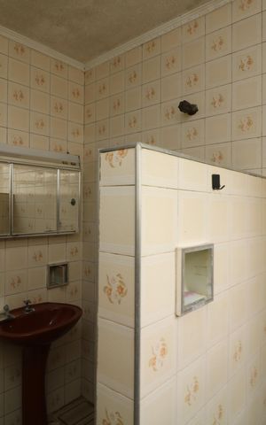 Casa à venda com 250m², 4 quartos e 2 vagasBanheiro