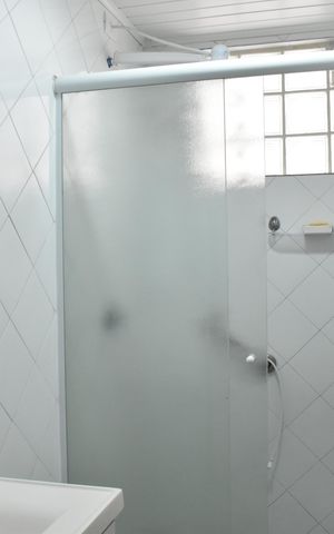 Casa de condomínio para alugar com 300m², 3 quartos e 4 vagasBanheiro da Suíte 1